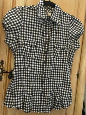 Buttoned down black & white Gingham with Crystal peace Emblem .